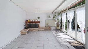 Wintergarten mit Kamin
